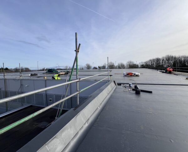 flat roofing contractors near me for commercial building 
